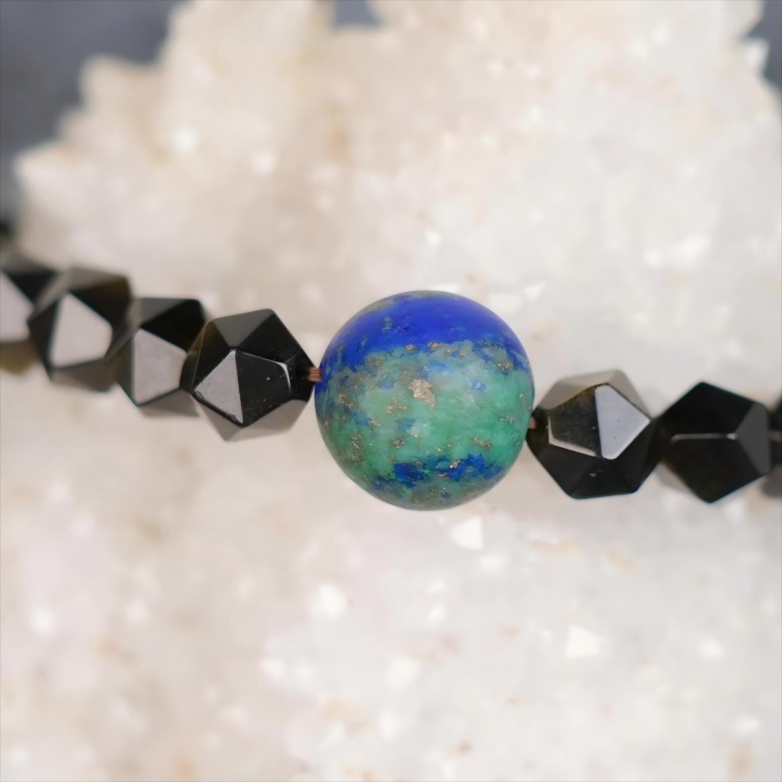 Embrace the cosmic energy with the Planet Legend Phoenix Lapis Lazuli Bracelet, featuring 12mm Matte Phoenix Lapis Lazuli beads paired with Golden Obsidian. This striking combination symbolizes wisdom, protection, and the vast energy of the universe.